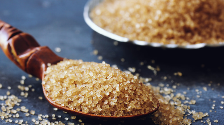 brown sugar crystals on spoon