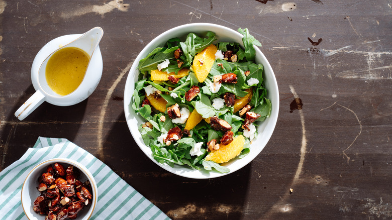 Candied nuts on a green salad