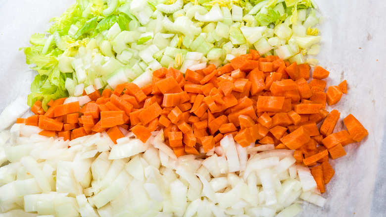 https://www.thedailymeal.com/img/gallery/the-three-vegetables-of-mirepoix-and-how-to-properly-cut-them/what-is-mirepoix-1679675286.jpg