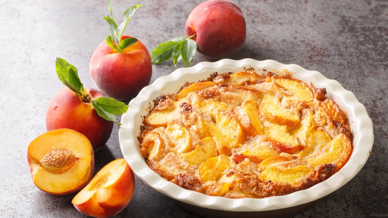 Peach cobbler and four peaches