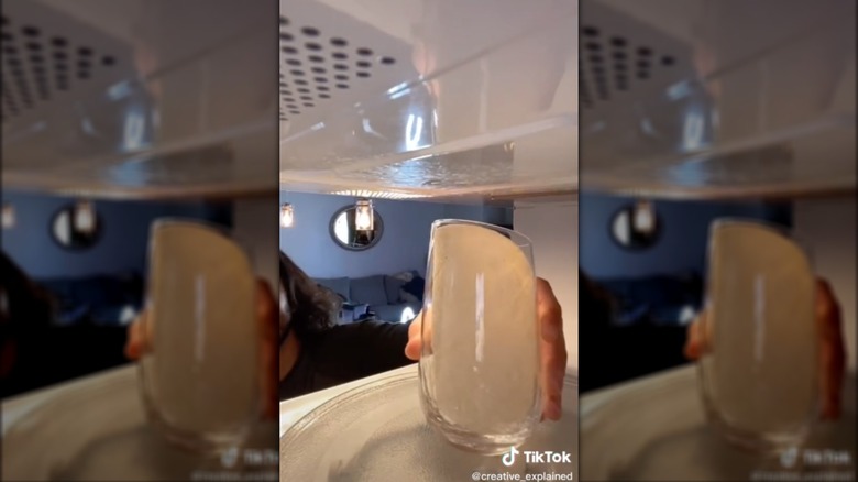 placing tortilla in glass in microwave