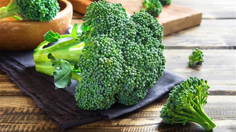 Raw broccoli head on cloth napkin 