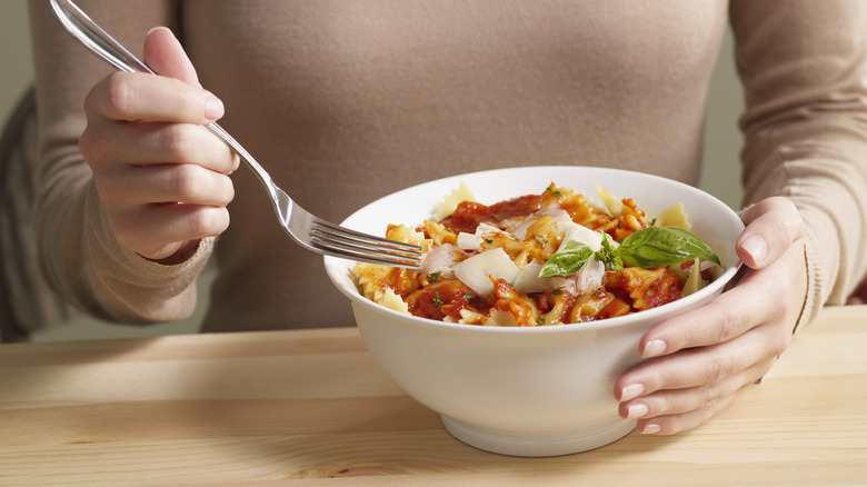 A bowl of tomato pasta 