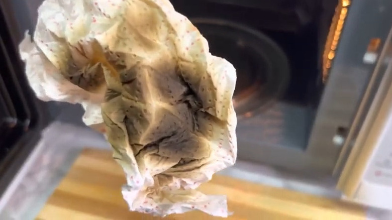 Burnt crumpled paper towel