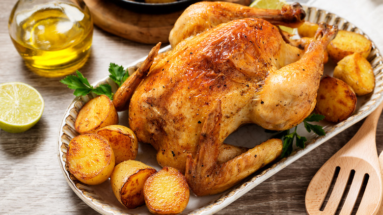 Roast chicken with potatoes and onions