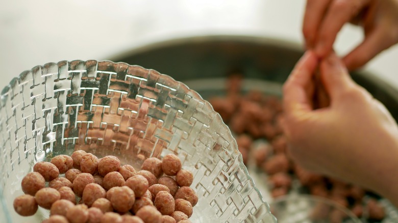 Person making meatballs