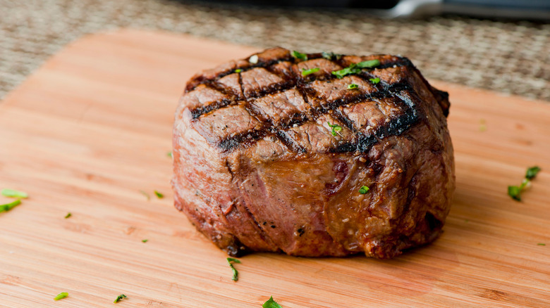 Grilled filet mignon on board