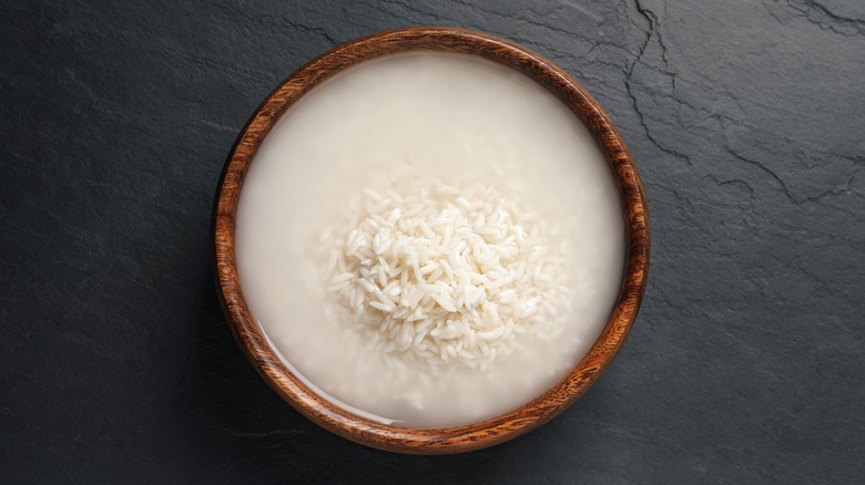 Bowl of rice soaking in water