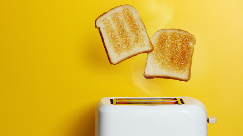 Toast popping up from toaster