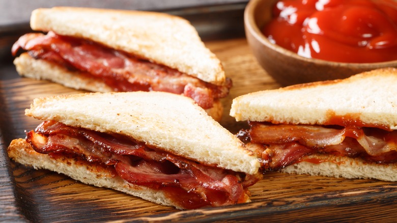 Toasted sandwich on wood surface