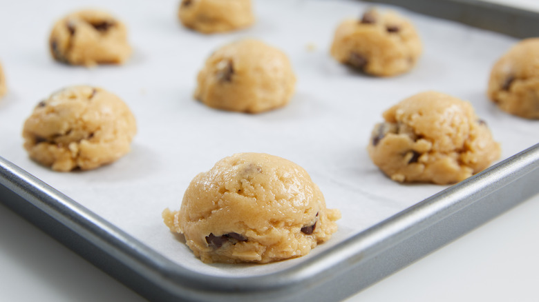 Chocolate chip cookie dough formed with scoop