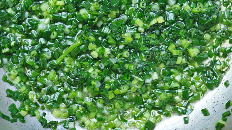 chopped green onions in oil