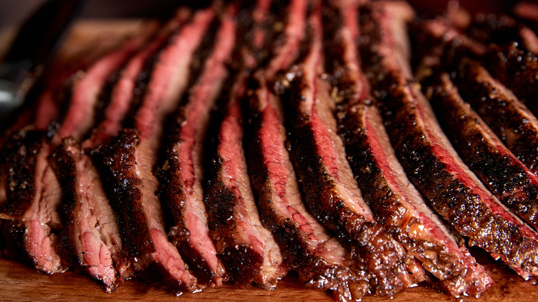 Brisket slices on a cutting board