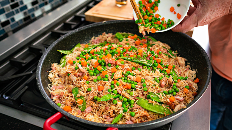 Fried rice in a pan on a stove