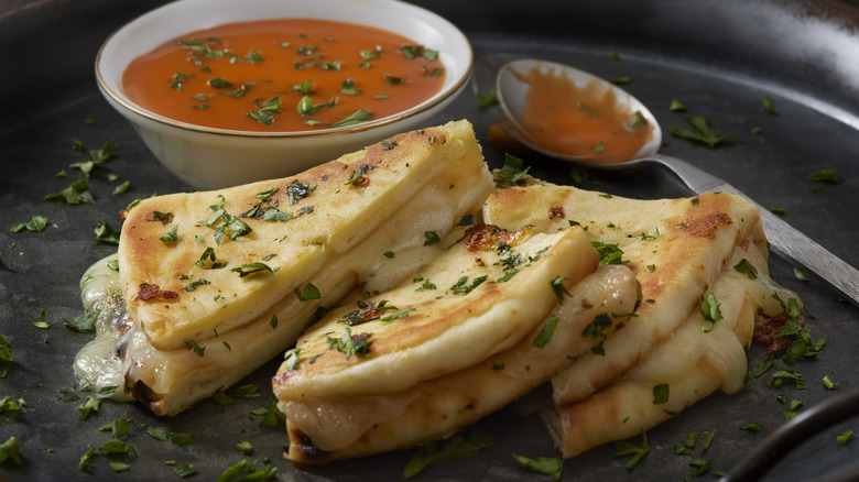 Garlic naan grilled cheese