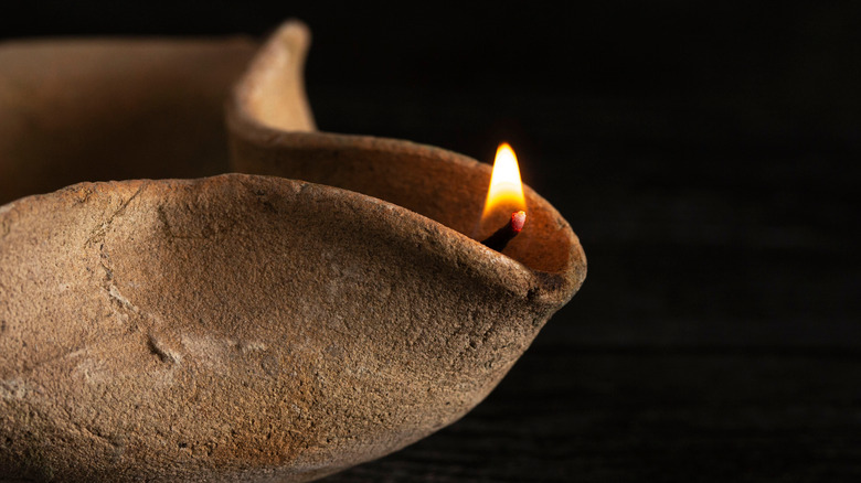 Ancient-style clay oil lamp