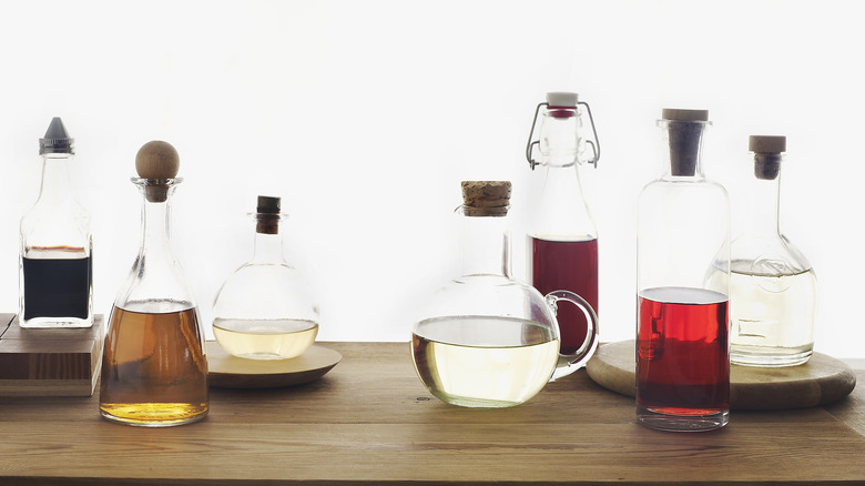 colored vinegar in bottles