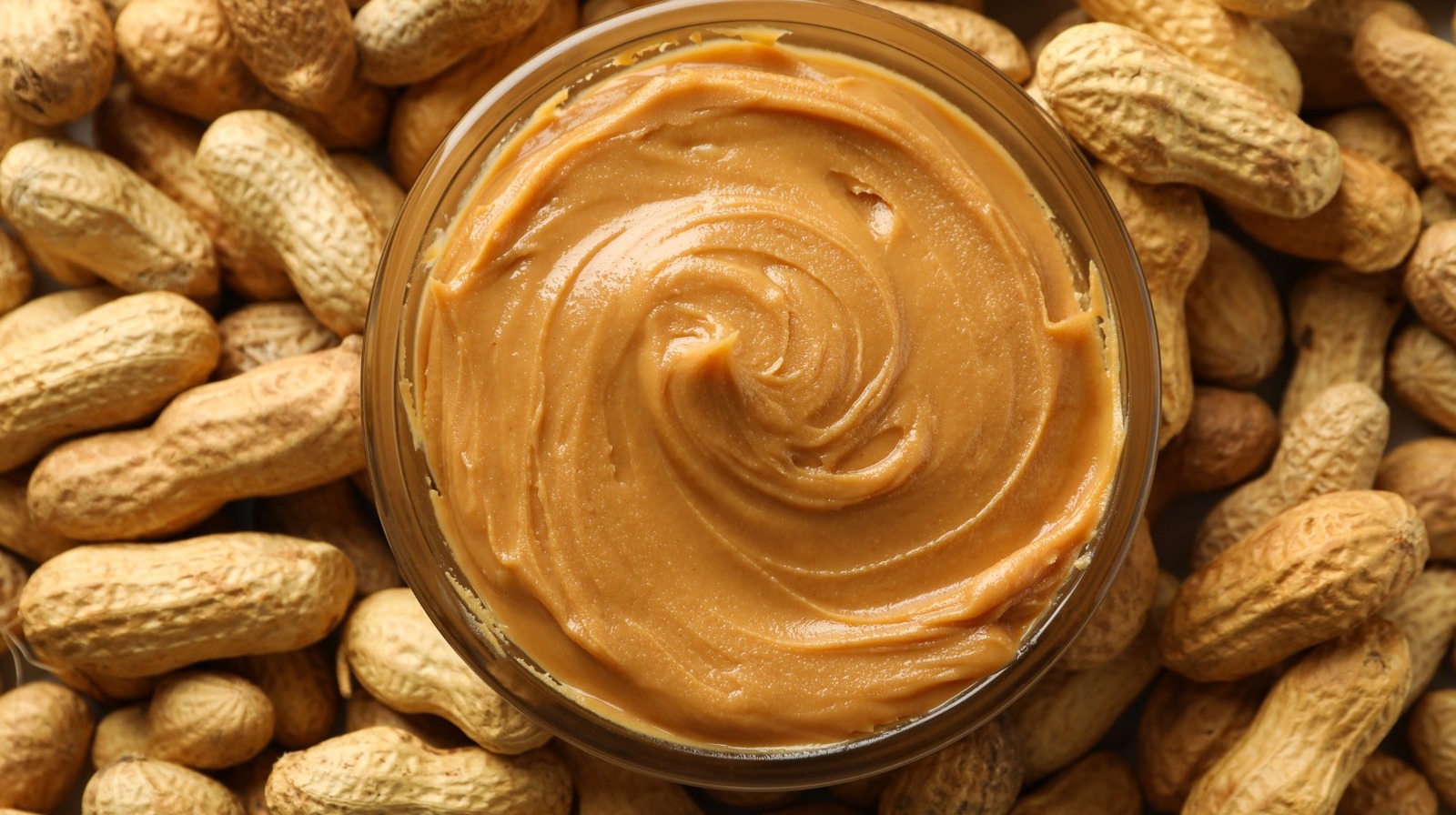 The Truly Bizarre Origins Of Peanut Butter