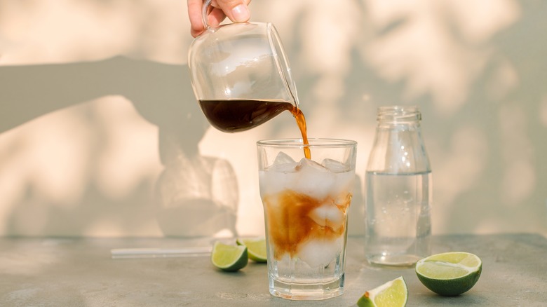 Pouring espresso into tonic water