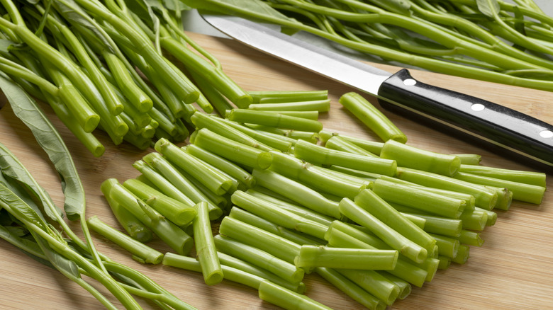 Water spinach on a cutting board