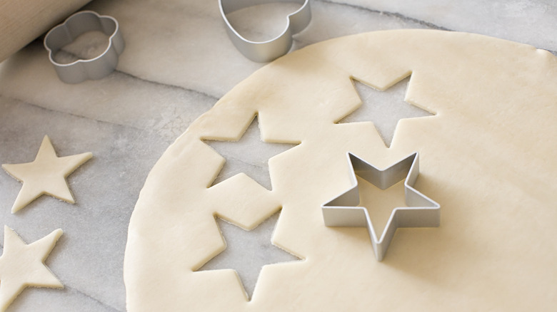 Cookie dough with star cutouts