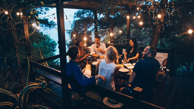 people dining on outdoor patio