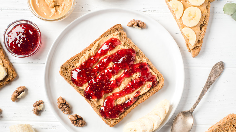 slices of bread with PB&J and peanut butter and banana