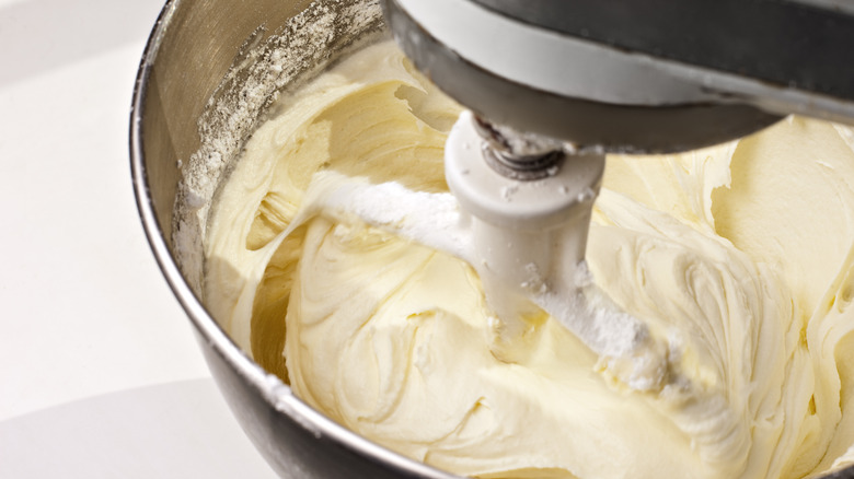 Goat cream cheese frosting being combined in mixer