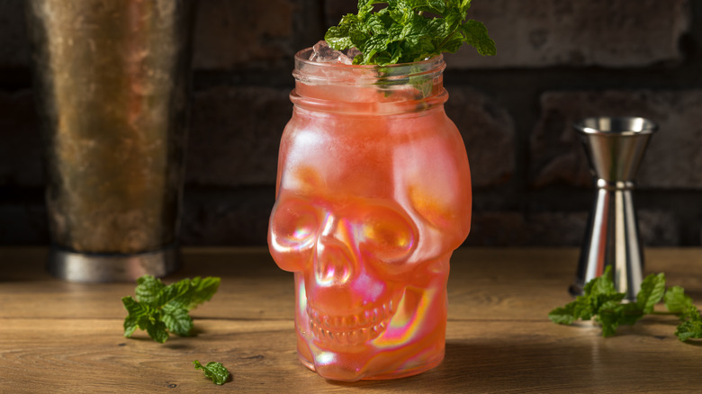 Zombie cocktail in skull glass