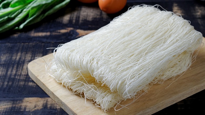 Rice vermicelli on wooden board