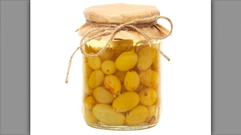 Jar of preserved grapes