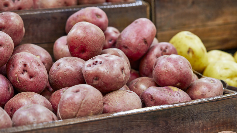 Red potatoes in crate
