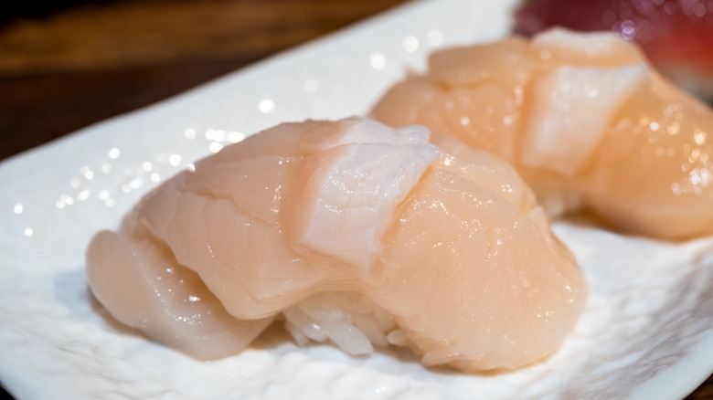 Scallop sashimi on plate