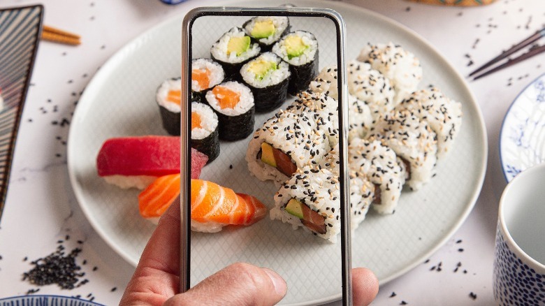 Taking photo of sushi