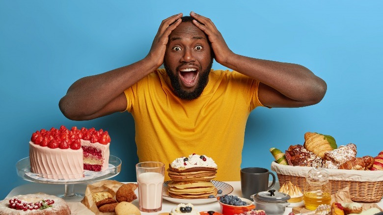 Man with lots of food