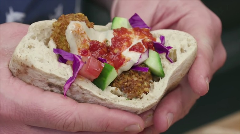 A falafel pita in hands