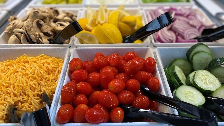 salad bar with food sections 