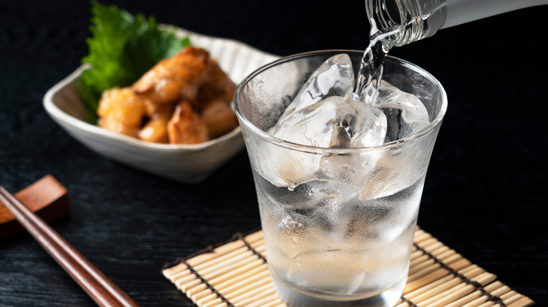 glass of shochu poured