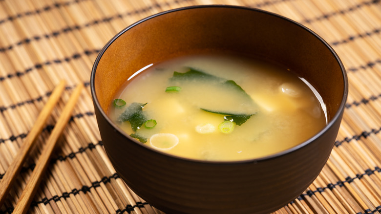 miso soup on bamboo placemat