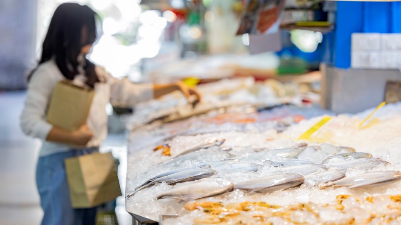 Woman at fish market