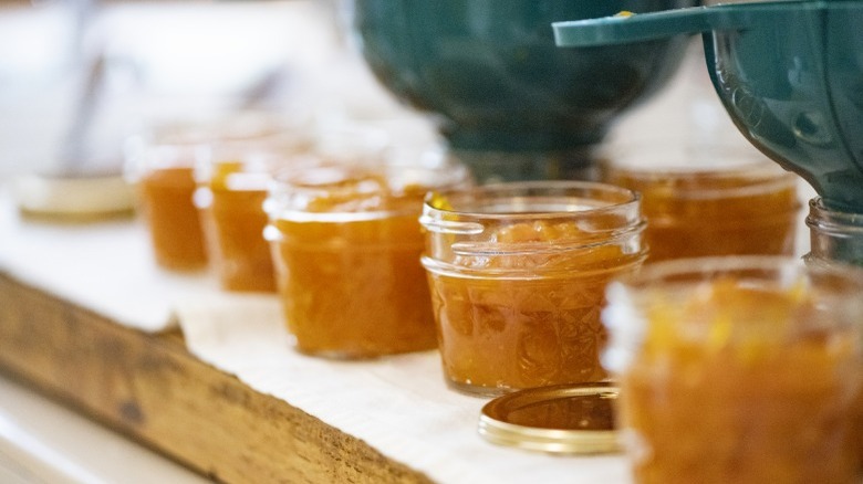 orange fruit in jars 