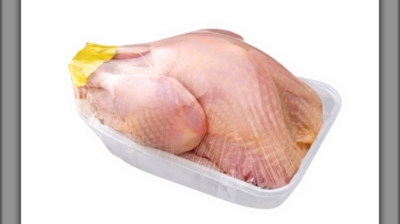 Whole raw turkey in package