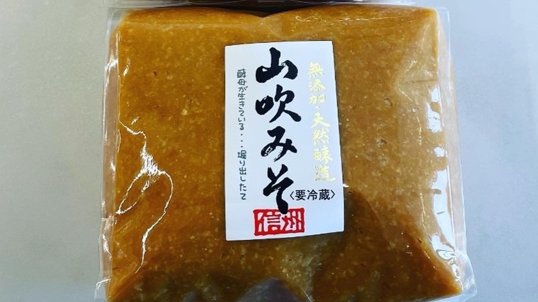 yellow miso in a container