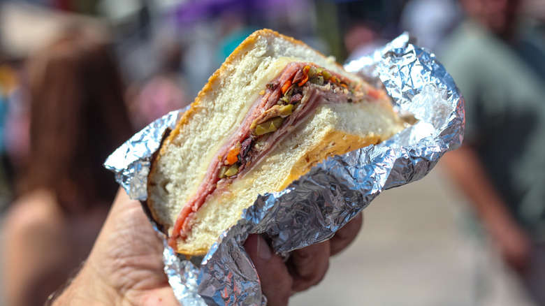 muffuletta sandwich in tinfoil