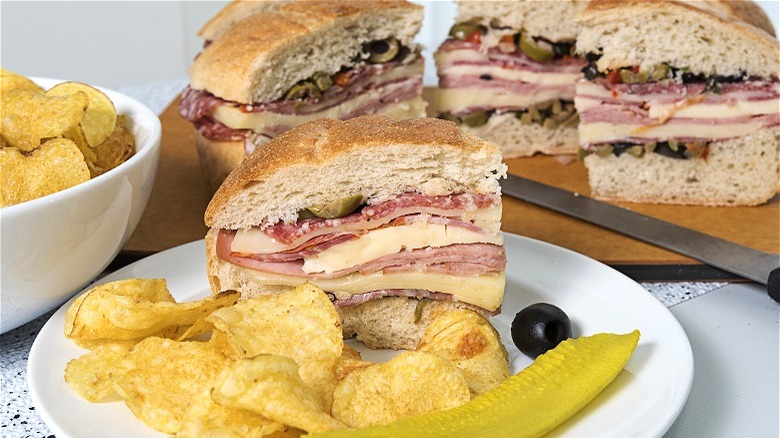 muffuletta with chips and pickles