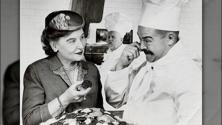 Margaret Rudkin standing with chef