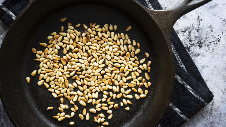 Toasted pine nuts iron skillet