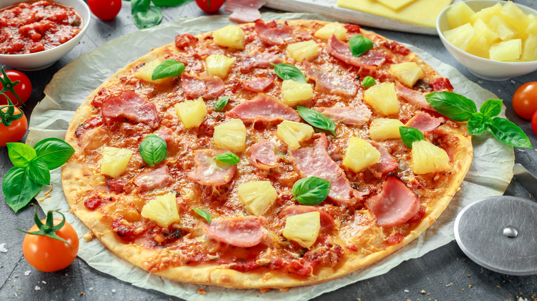 Hawaiian pizza with pineapples and ham