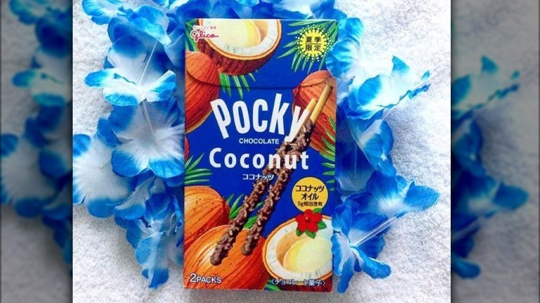 Coconut chocolate pocky on flowers