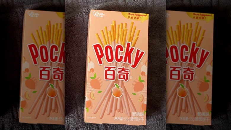 Peach cream pocky on blanket